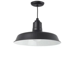 A black barn-style pendant light with a white interior hangs from a black cord