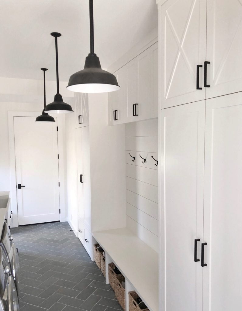 Black Ceiling Lights in White Mudroom with Grey Tiles