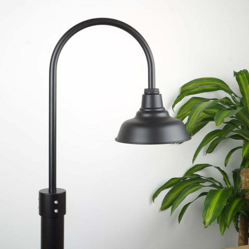 25cm Universal Post Mount Light in Black Ace on White Wall with Green Plant adjacent