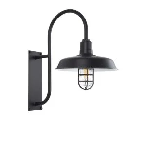 A black gooseneck wall light with a caged bulb is shown against a white background