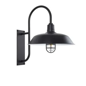 A black gooseneck wall light with a caged bulb is shown against a white background