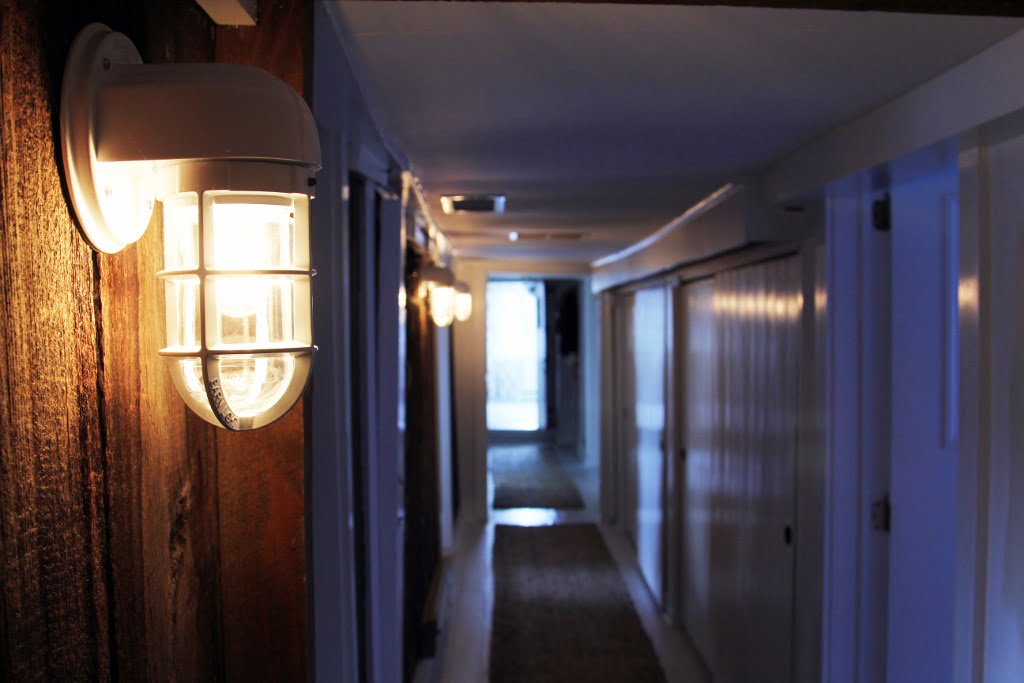 Closeup of our Streamline Moderne Sconce in a converted dairy barn.
